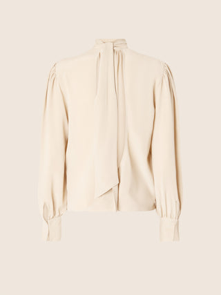 BLUSA CON SCOLLATURA DIETRO