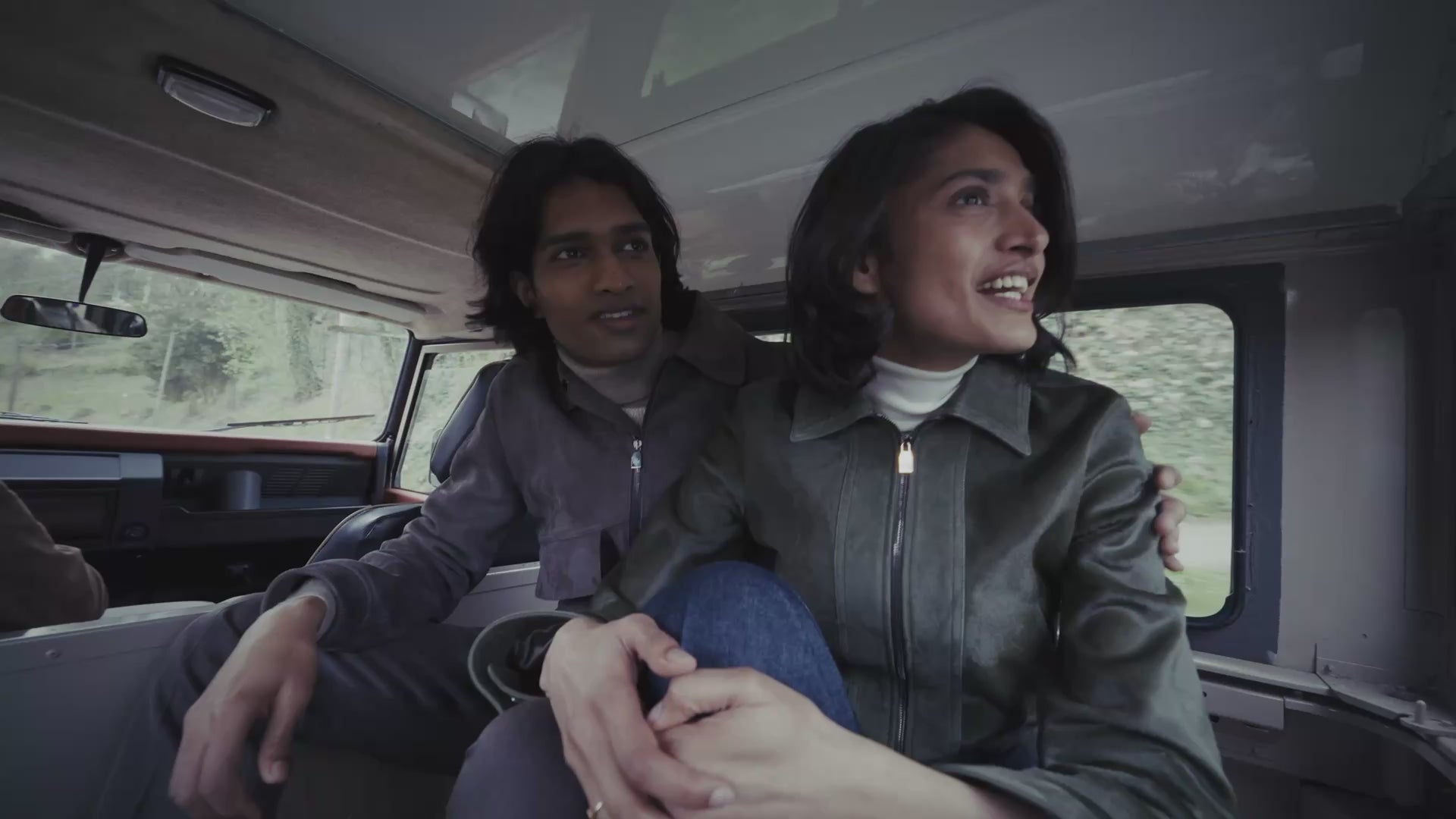 Fashion campaign video featuring models in autumn-toned outfits across a series of outdoor and lifestyle scenes.
